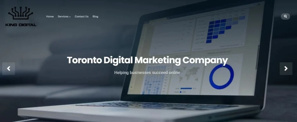 King Digital website homepage banner displaying "Toronto Digital Marketing Company" over a blurred image of a laptop with charts and graphs on the screen.