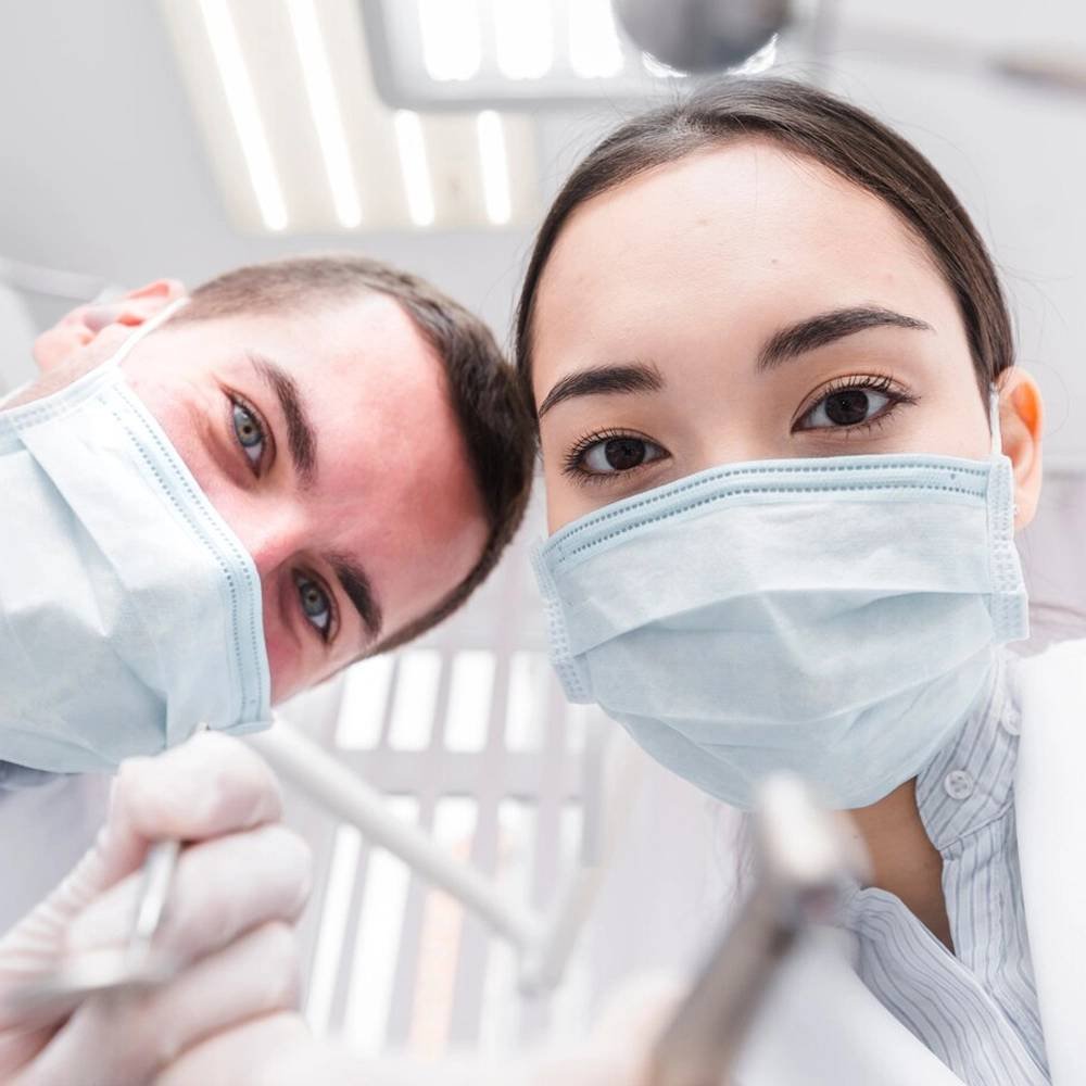 Dentist with patient
