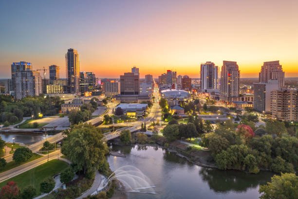 An aerial sunset view of the London Ontario skyline and Thames River, representing a top digital marketing agency London.