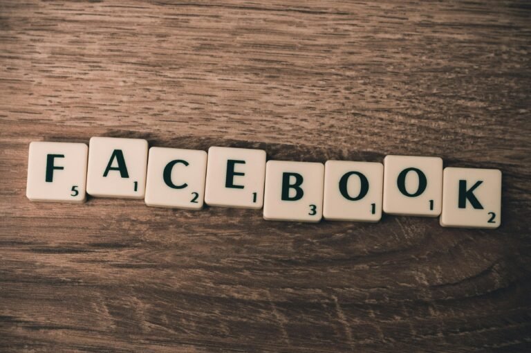 Scrabble tiles spelling Facebook symbolizing Facebook pixel tracking and first-party data strategy.