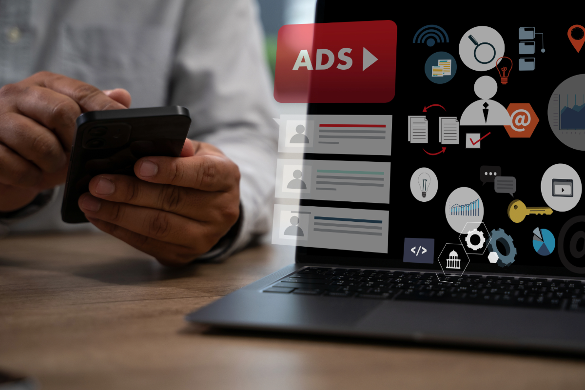 Google Ads dashboard with AI icons showing automated bidding, targeting, and ad ranking on a laptop screen.