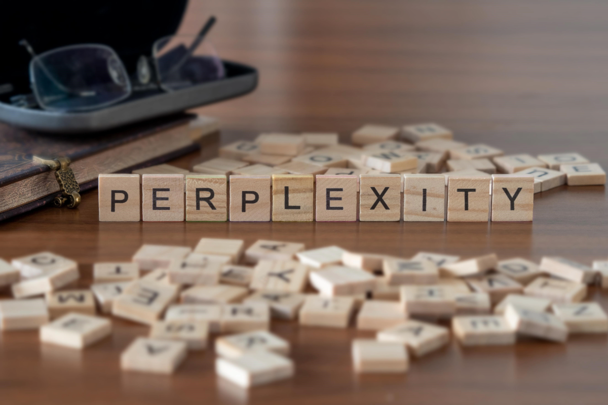 Perplexity text made from letter tiles illustrating AI search and SEO for Perplexity visibility.
