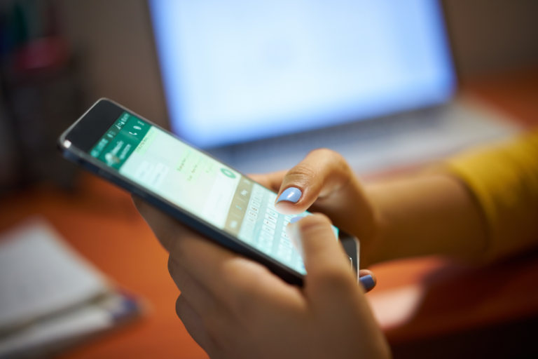 Person texting on smartphone illustrating WhatsApp Ads and click-to-WhatsApp campaign strategy.